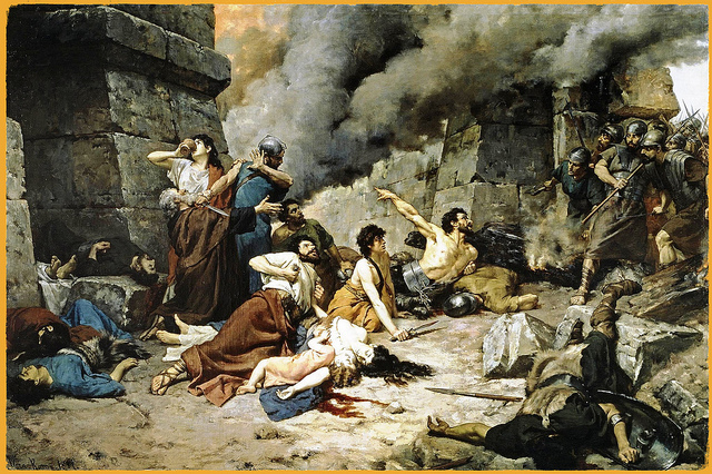 El cuadro representa la caída de Numancia con los numantinos dándose muerte y la ciudad incendiada