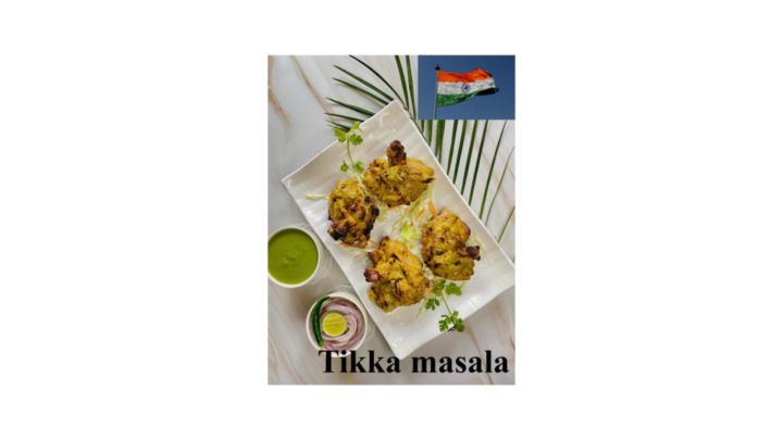 Se observa dos platos con el típico pollo preparado en la India.
