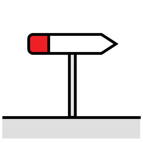 Una señal vertical de color rojo y blanco indica la dirección que podemos tomar.