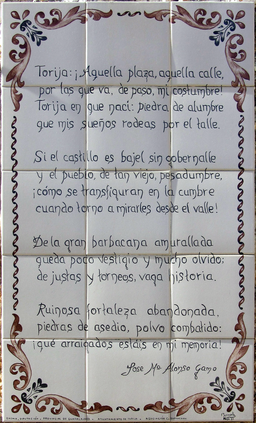 Azulejos decorados con una filigrana y un poema.