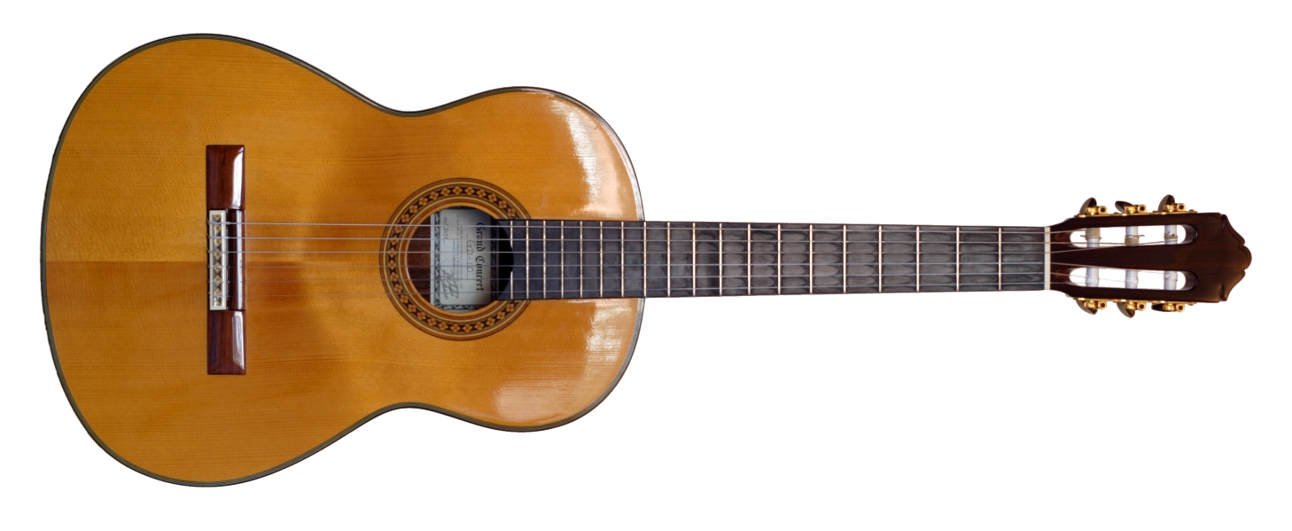 La imagen muestra una guitarra española.
