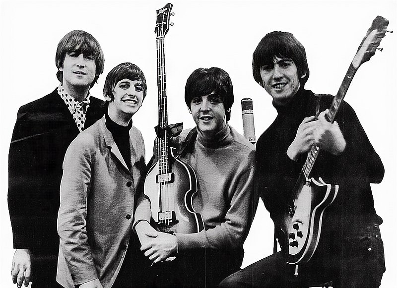 Imagen de los Beatles con guitarras