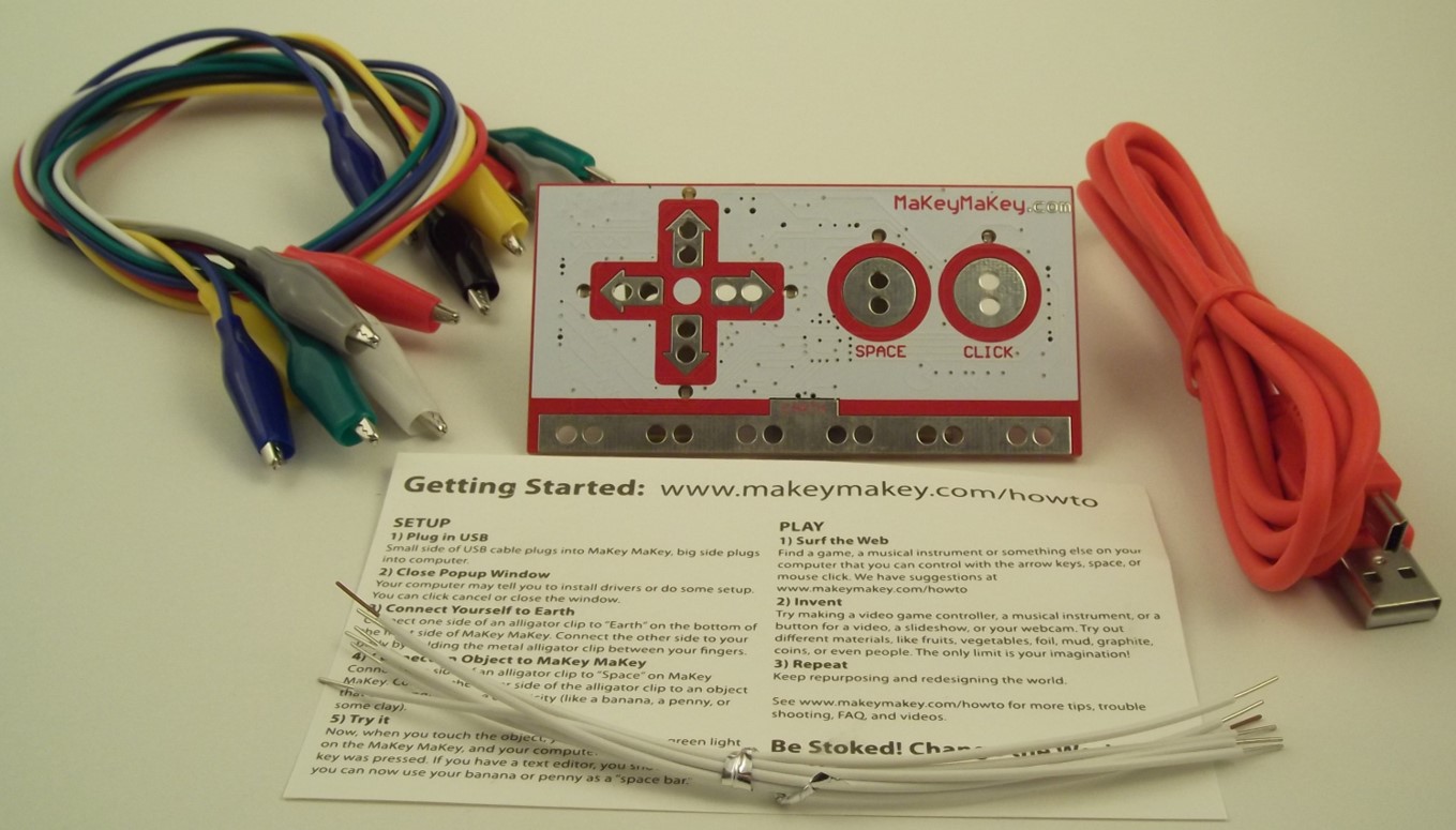 Kit de robótica: placa, cables y folleto.