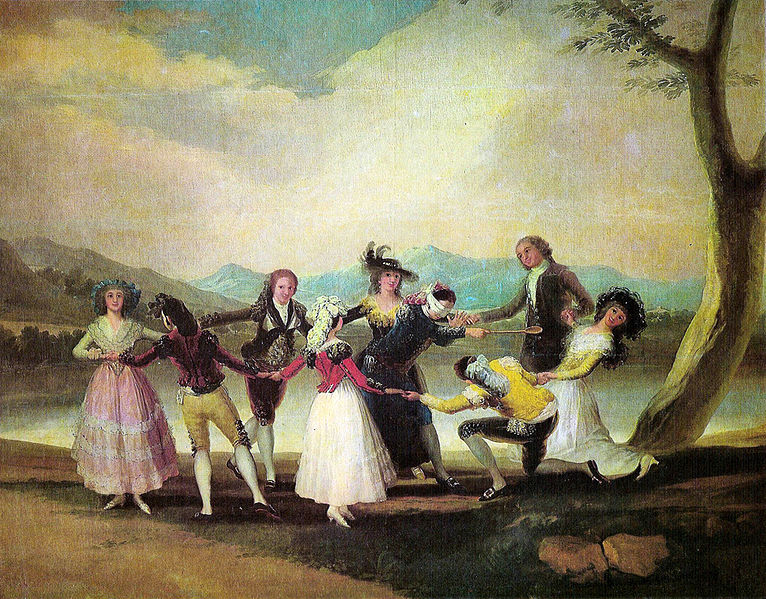 Un grupo de personas bailan el tradicional baile de "La gallina ciega"