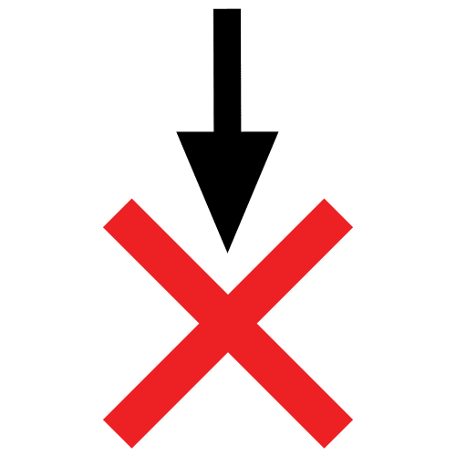 La imagen muestra una aspa roja en el suelo con una flecha negra sobre ella que la señala.