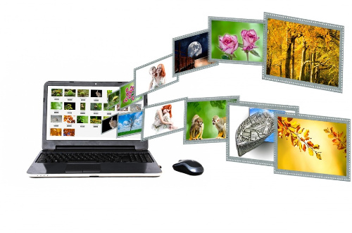 La imagen muestra la pantalla de un ordenador portátil presentando un mosaico de fotografías del que salen muchas otras imágenes.