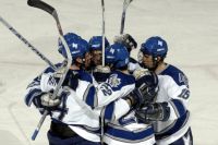 Jugadores de hockey en corro