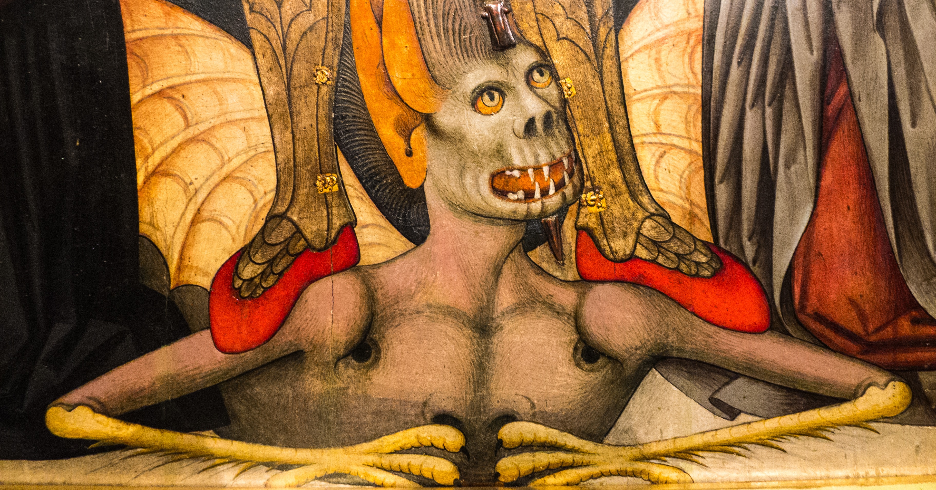 La imagen muestra la ilustración de un demonio medieval