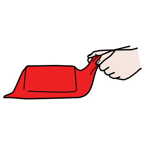 La imagen muestra una mano tapando, con un trapo rojo, un objeto.