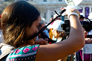 girl taking a photo