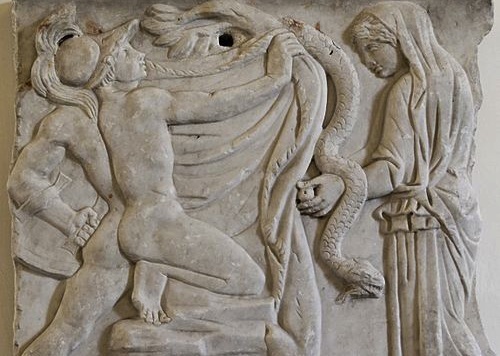 Jasón consigue el vellocino de oro arrebatándoselo al dragón que lo custodia ante la mirada de Medea