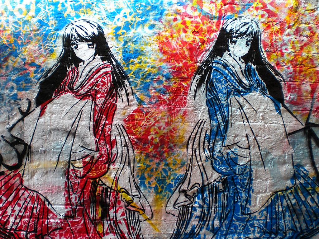 La imagen muestra el graffiti de dos mujeres ataviadas con un traje típico japonés.