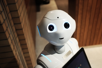 Imagen de un robot de servicio con forma humanoide de apariencia entrañable.