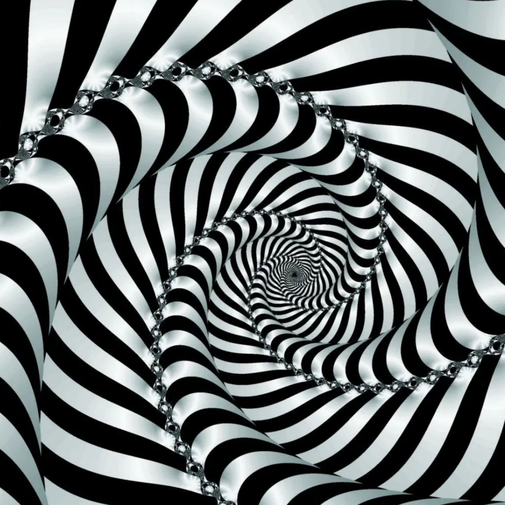 La imagen muestra una serie de líneas que se unen en el centro en espiral y que parece que tienen volumen y se salen del dibujo