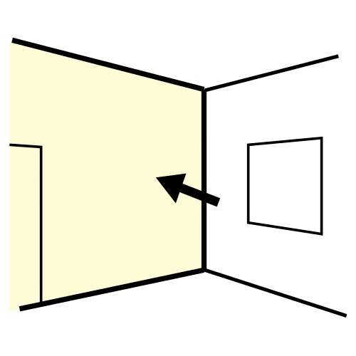 La imagen muestra dos paredes de una casa haciendo esquina y una de ellas es señalada con una flecha y está coloreada