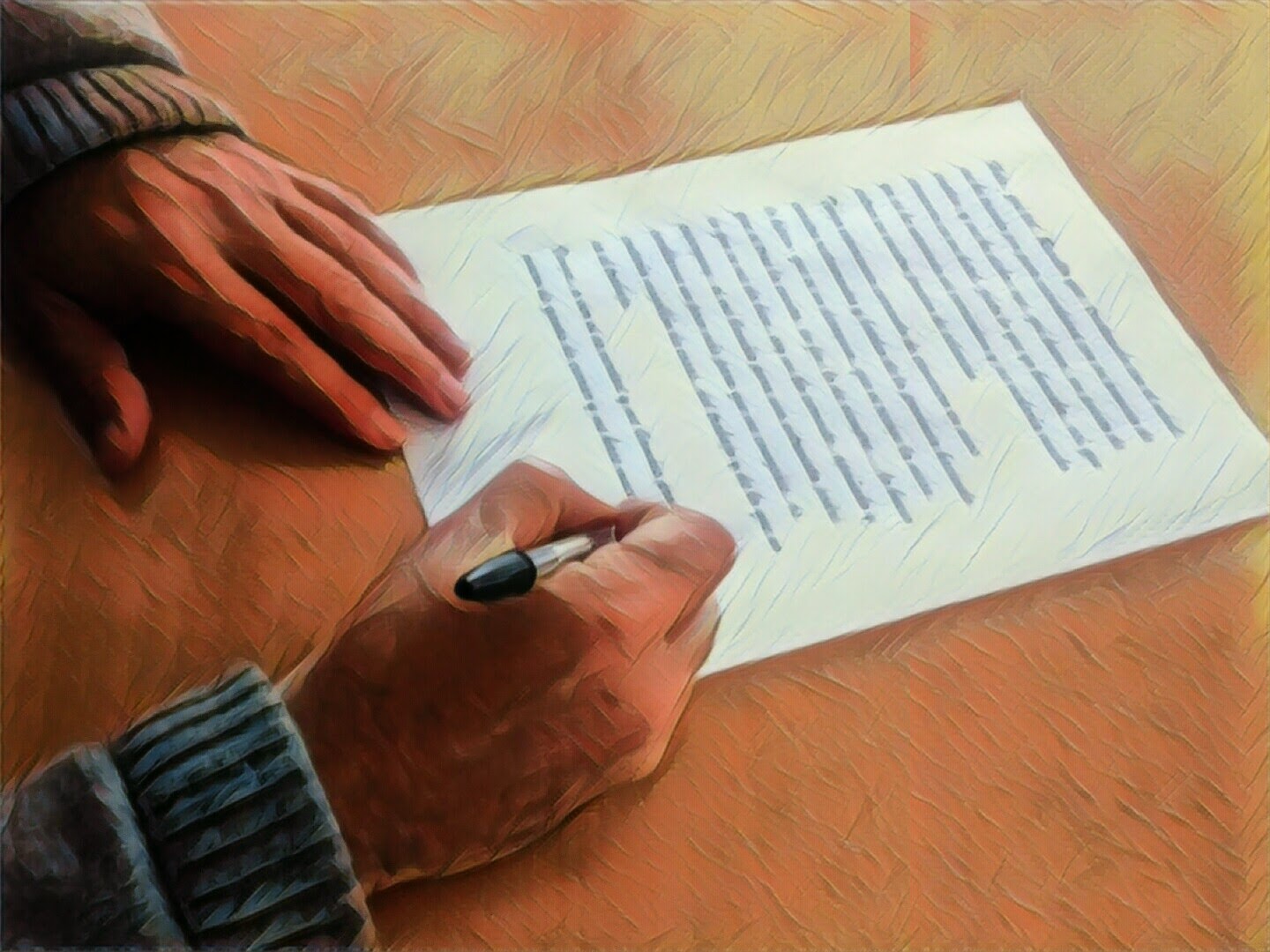 manos escribiendo una carta