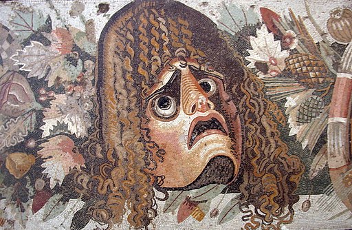 Máscara sobre hojas representada en un mosaico