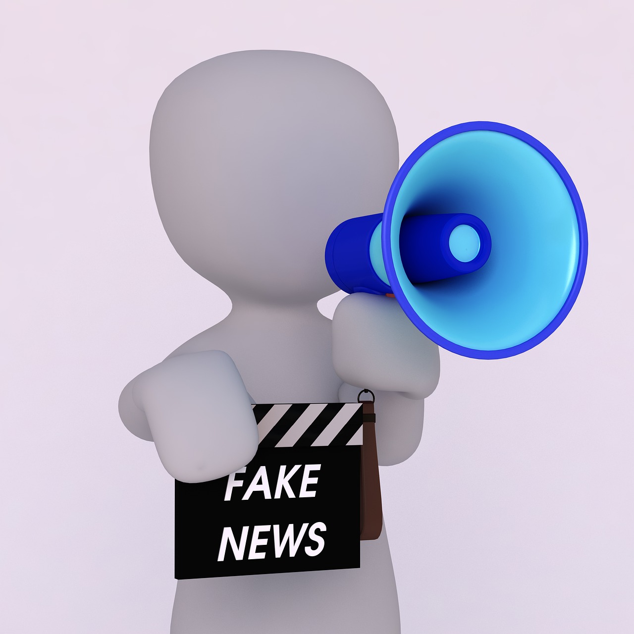 Sujeto con un cartel donde pone escrito fake news, noticias falsas, difundiéndolas con un altavoz en la mano.