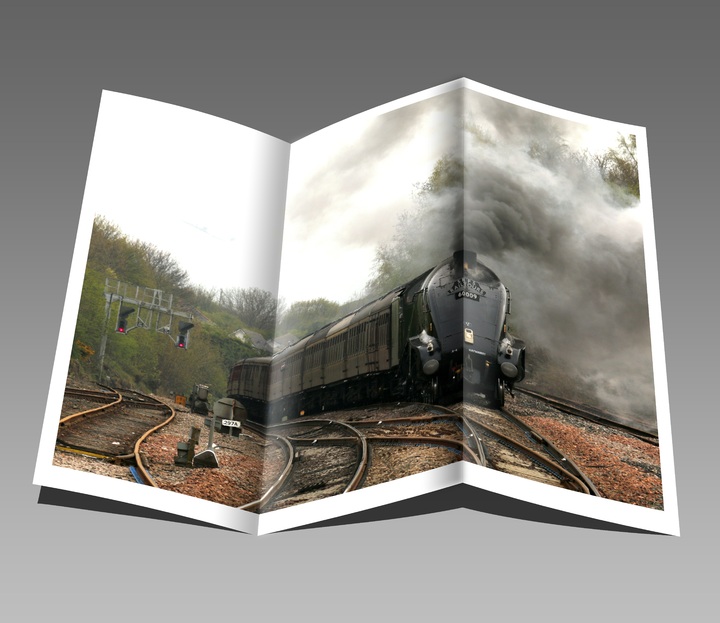 La imagen muestra un panfleto donde se ve un tren a vapor.