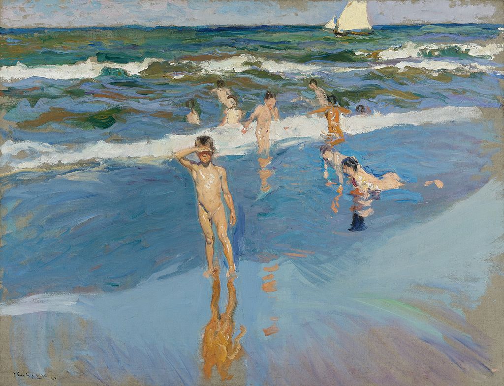 La imagen muestra niños jugando en el agua