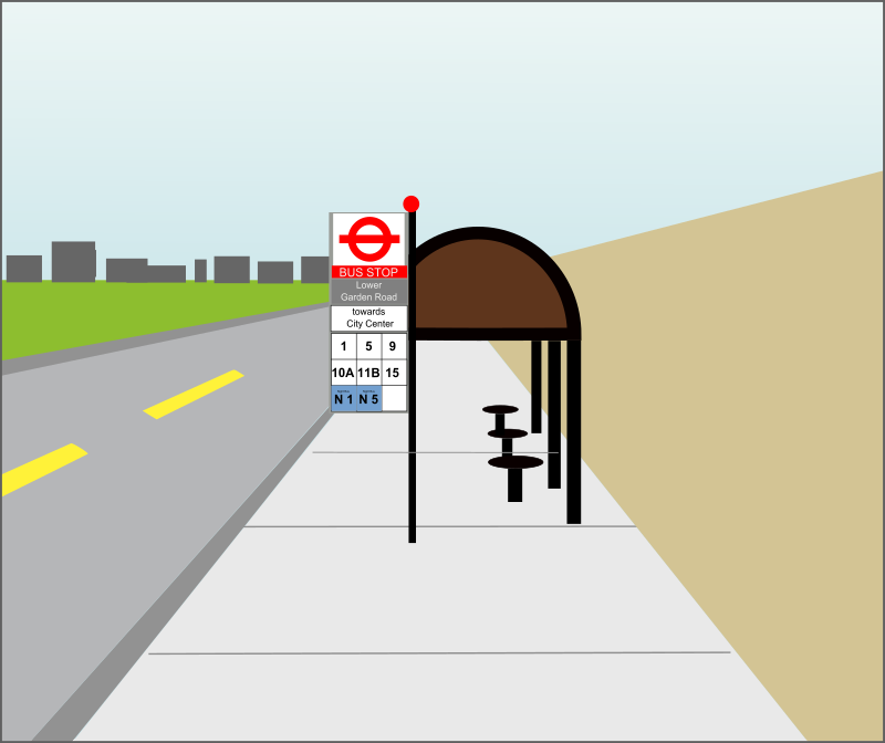 La imagen muestra una parada de autobús en una calle