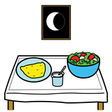 Mesa con un plato de comida, un bol de ensalada y un yogur. En la pared hay un cuadro con una luna.