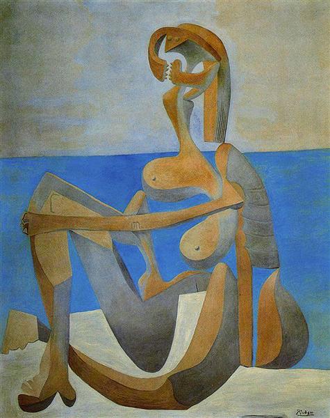 Mujer a la orilla del mar