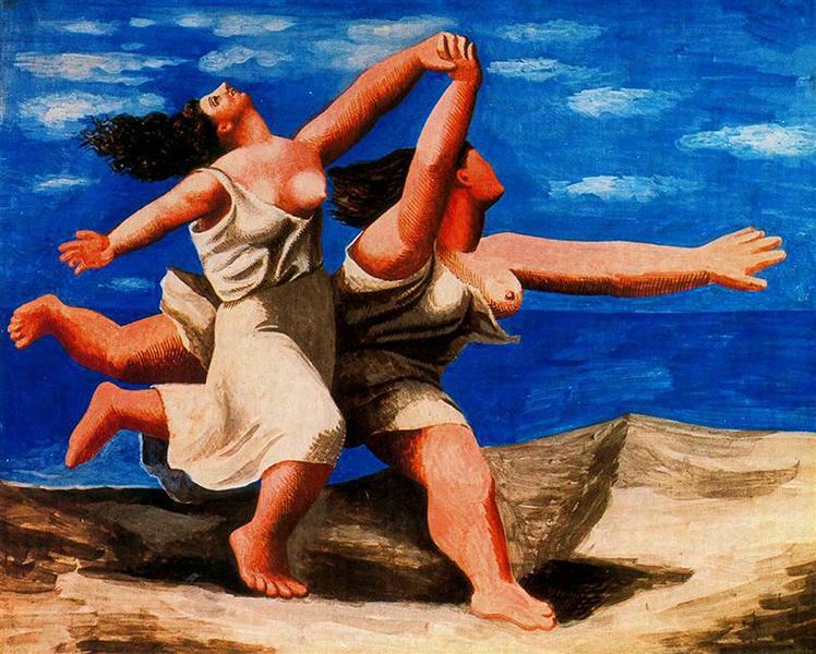 Mujeres corriendo a la orilla del mar