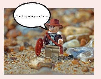 Esta imagen muestra una figura de LEGO que representa a Indiana Jones con un bocadillo que dice Si es lo que te gusta, hazlo.